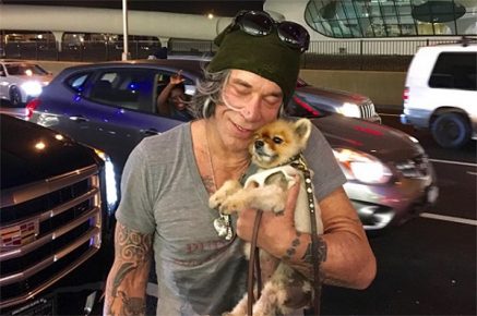 Mickey Rourke mit einem Hund